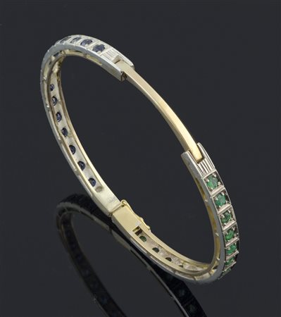 Bracciale rigido in oro rosa e argento con zaffiri e smeraldi, primi '900