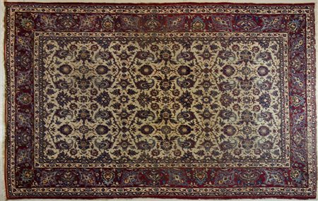 Tappeto su fondo rosso cm. 203x280.