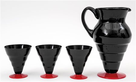 NAPOLEONE MARTINUZZI Una caraffa e tre bicchieri, anni "30. Vetro soffiato....