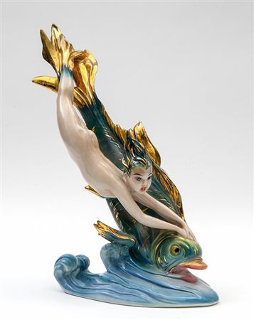 A. PANNUNZIO Figura di sirena con pesce, anni '50. Ceramica decorata. Altezza...