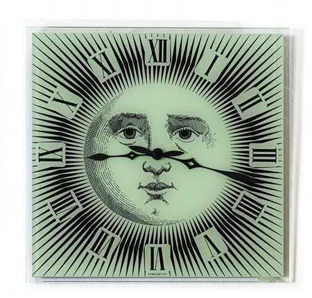 FORNASETTI Un orologio da parete, anni '80. Vetro serigrafato, plastica....