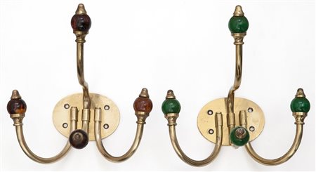 LUIGI CACCIA DOMINIONI Due appendiabiti da parete, anni '50. Ottone, lucite....