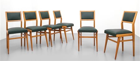 SEI SEDIE, anni '50. Legno di faggio, imbottiture rivestite in vinilpelle....