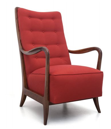 UNA POLTRONA, anni '50. Legno di noce, imbottiture rivestite in tessuto....