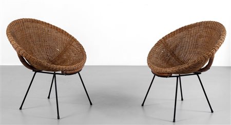 DUE POLTRONCINE, anni '50. Ferro verniciato, malacca, midollino. Altezza cm...