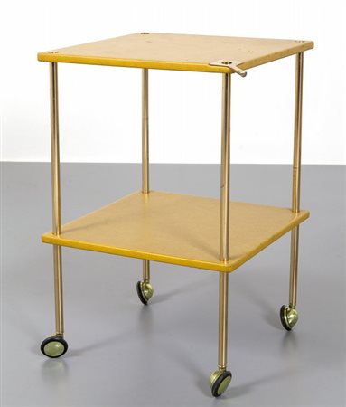 LUIGI CACCIA DOMINIONI Un tavolino su rotelle per AZUCENA, 1957. Ottone,...