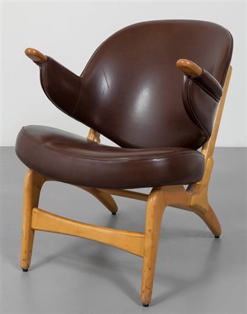 PRODUZIONE DANESE, anni '60. Una poltroncina in legno di acero con...