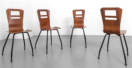 QUATTRO SEDIE, anni '60. Tubo di ferro verniciato, compensato di mogano...