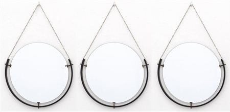 TRE SPECCHI DA PARETE, anni '60. Acciaio verniciato, ottone ossidato...