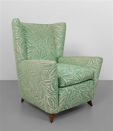 PAOLO BUFFA Una poltrona, anni '50. Struttura in legno, piedini in legno di...