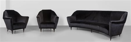 ICO PARISI Un sofà e due poltrone, anni '60. Struttura e gambe in legno,...