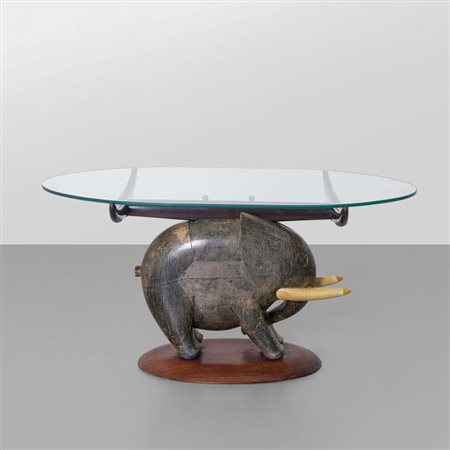 ALDO TURA Un tavolino, anni '50. Legno di palissandro, legno rivestito in...