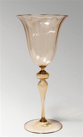 VITTORIO ZECCHIN, CAPPELLIN VENINI & C. Un vaso in vetro trasparente a forma...