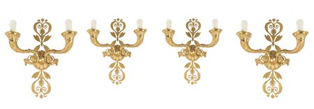 Quattro appliques a due fiamme in bronzo dorato, Francia fine XIX secolo....
