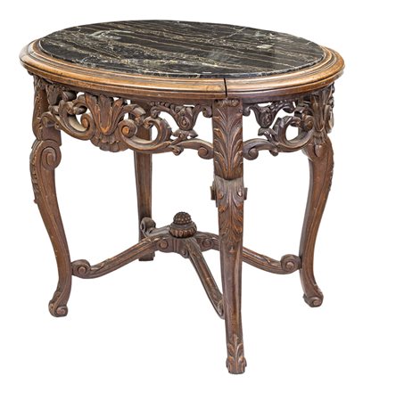 Tavolino ovale in legno intagliato; piano incassato in marmo portoro, fascia...