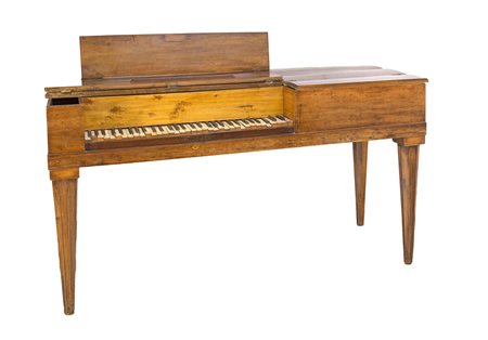 Spinetta in noce con tastiera collocata in una porzione rientrante della...