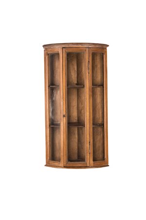 Piccola angoliera in ciliegio, con facciata mistilinea in vetro centrata da...