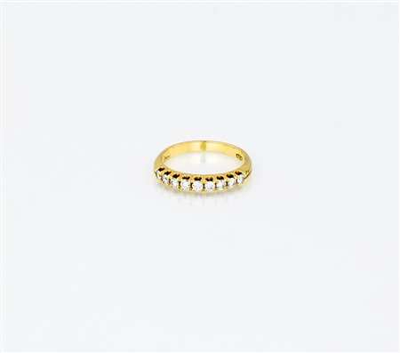 Fedina in oro giallo con 9 brillanti, ct 0,45 g 3,20