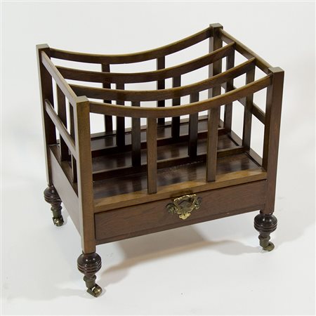 Portariviste in legno con cassetto.