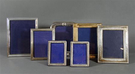 Lotto di 7 cornici portafoto in argento.