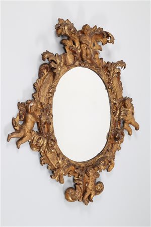 MANIFATTURA LOMBARDA DEL XVII SECOLO Coppia di imponenti specchiere dorate e...