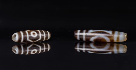 Arte Himalayana Due dzi, una con un occhio ed una con tre occhi . . Cm 5,00....