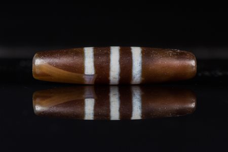 Arte Himalayana Chung dzi a tre bande . . Cm 5,30. Arte Himalayana A three...