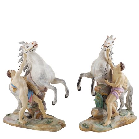 Due gruppi in porcellana policroma manifattura europea, inizio XX Sec....