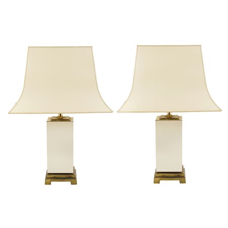 Coppia di lampade da tavolo in metallo dorato XX Sec. h. 50 cm. base...