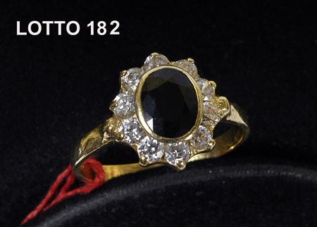ANELLO CON ZAFFIRO A FIORE IN ORO GIALLO 750 % GRAMMI 4,40 ZAFFIRO NERO...