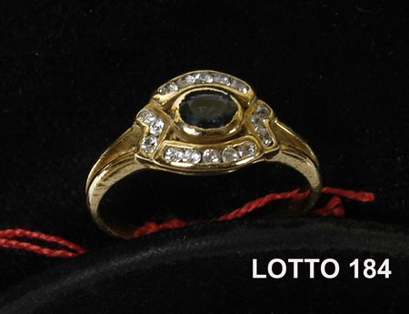 ANELLO CON PIETRA BLU IN ORO GIALLO 750 % PESO 3,95 ZIRCONI CON PIETRA BLU