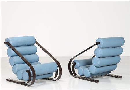 CECCHI MARZIO Coppia di poltrone in metallo laccato nero e pelle, mod....