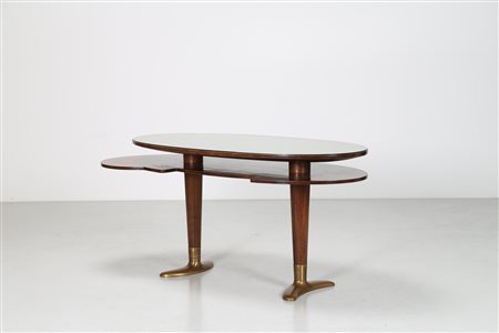 GARIBOLDI GIOVANNI (1908 - 1971) Scrivania in teak con piedi in bronzo dorato...
