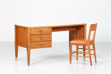 PONTI GIO' (1891 - 1979) Scrivania in noce, dettagli in ottone e piano in...