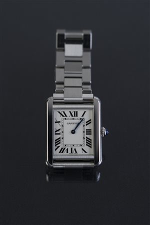CARTIER Orologio Cartier Tank in acciaio completo di bracciale. -. .