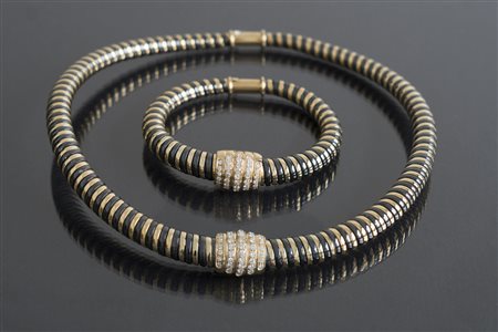 [Nessun Autore] Bracciale a molla in parure oro giallo gr 33 e acciaio...