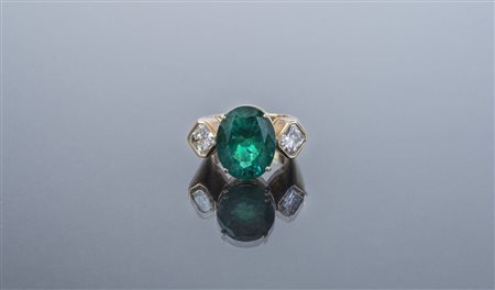[Nessun Autore] Anello con smeraldo colombiano ovale cts 8.40 e due diamanti...
