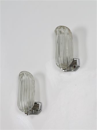 MANIFATTURA ITALIANA Coppia appliques in metallo cromato e vetro, Murano anni...