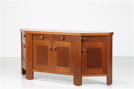 COPPOLA SILVIO (1920 - 1986) Credenza scantonata in noce, per Bernini, anni...
