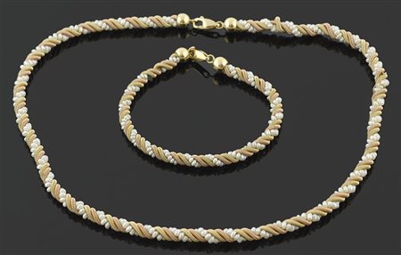 Collana e bracciale in oro giallo e rosa, lavorazione ad intreccio con perline