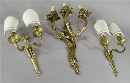 Lotto di 3 appliques in bronzo dorato di cui 2 in coppia.