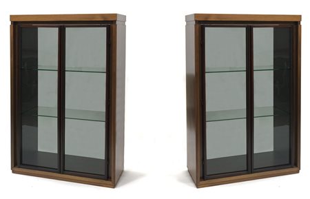 VETRINE Coppia di vetrine in legno di noce con ante in vetro fumé e telaio in...