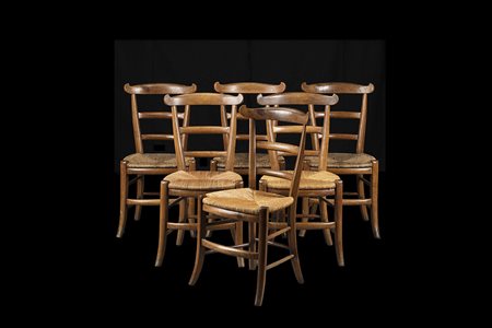 Gruppo di sei sedie con schienale traforato, gambe mosse unite da traverse,...