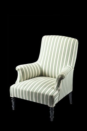 Poltrona b&eacute;rg&egrave;re con braccioli avvolgenti e piedi a rocchetto...