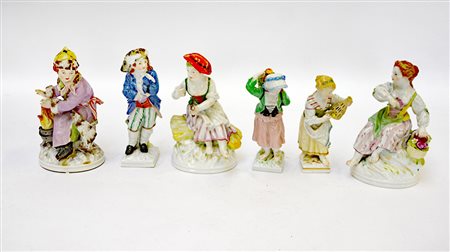 Manifattura KPM. Gruppo di sei statuette in porcellana policroma raffiguranti...