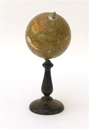 Globo terracqueo con base tornita in legno ebanizzato iscritto A. Vallardi...