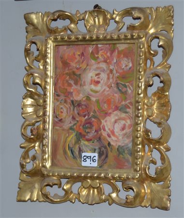 Cornicetta del secolo XIX in legno intagliato, traforato e dorato a volute...