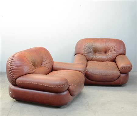 Coppia di poltrone in pelle marrone (difetti)