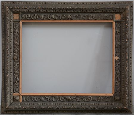 Cornice rettangolare in legno intagliato decorata con teste di cherubini,...