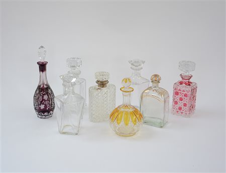 Lotto composto da due bottiglie di Boemia, una in cristallo con ghiera in...